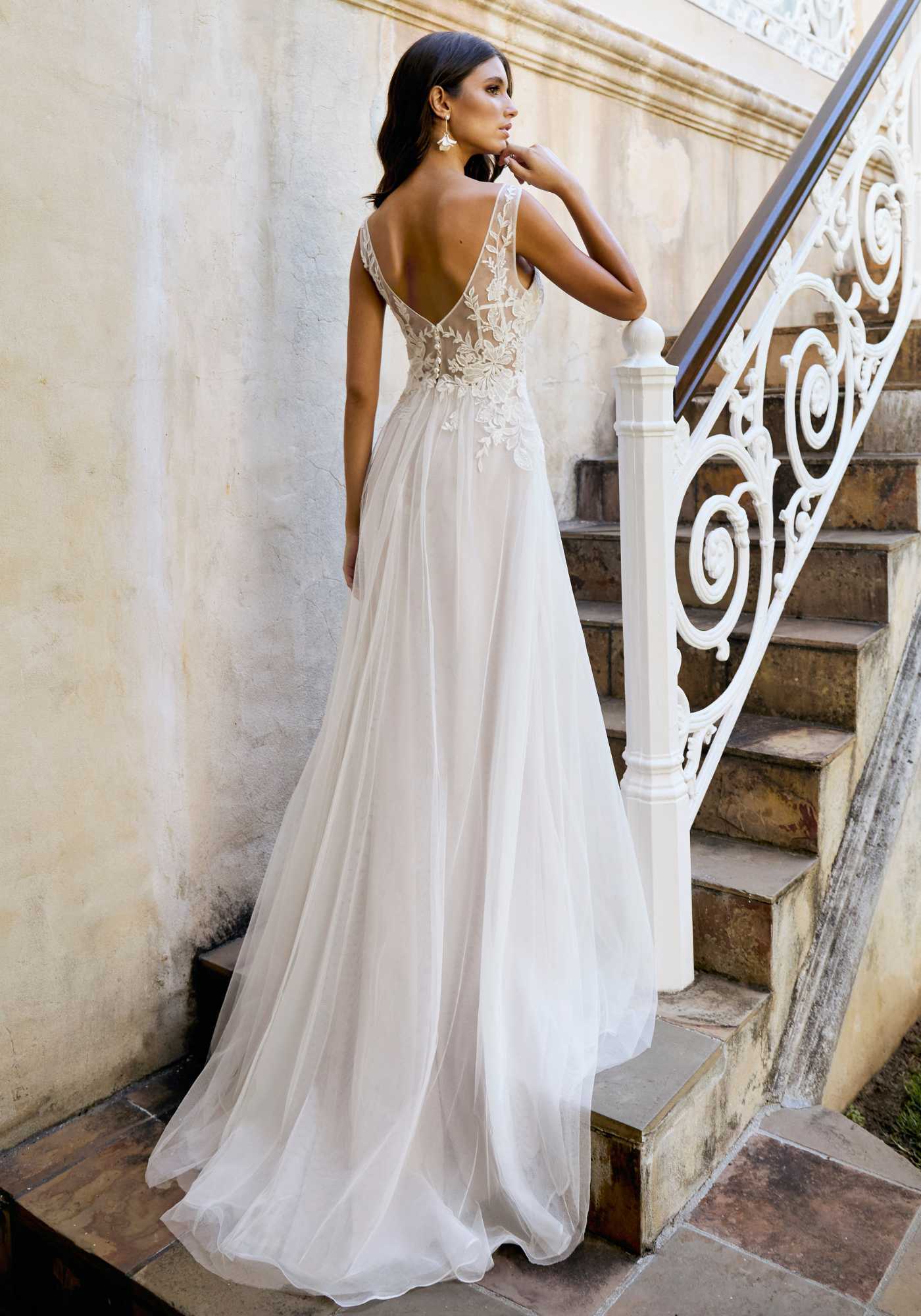 Whimsical A-line tulle and lace gown with detachable sleeves Kelsey Rose Whimsical A-line tulle and lace gown with detachable sleeves Kelsey Rose