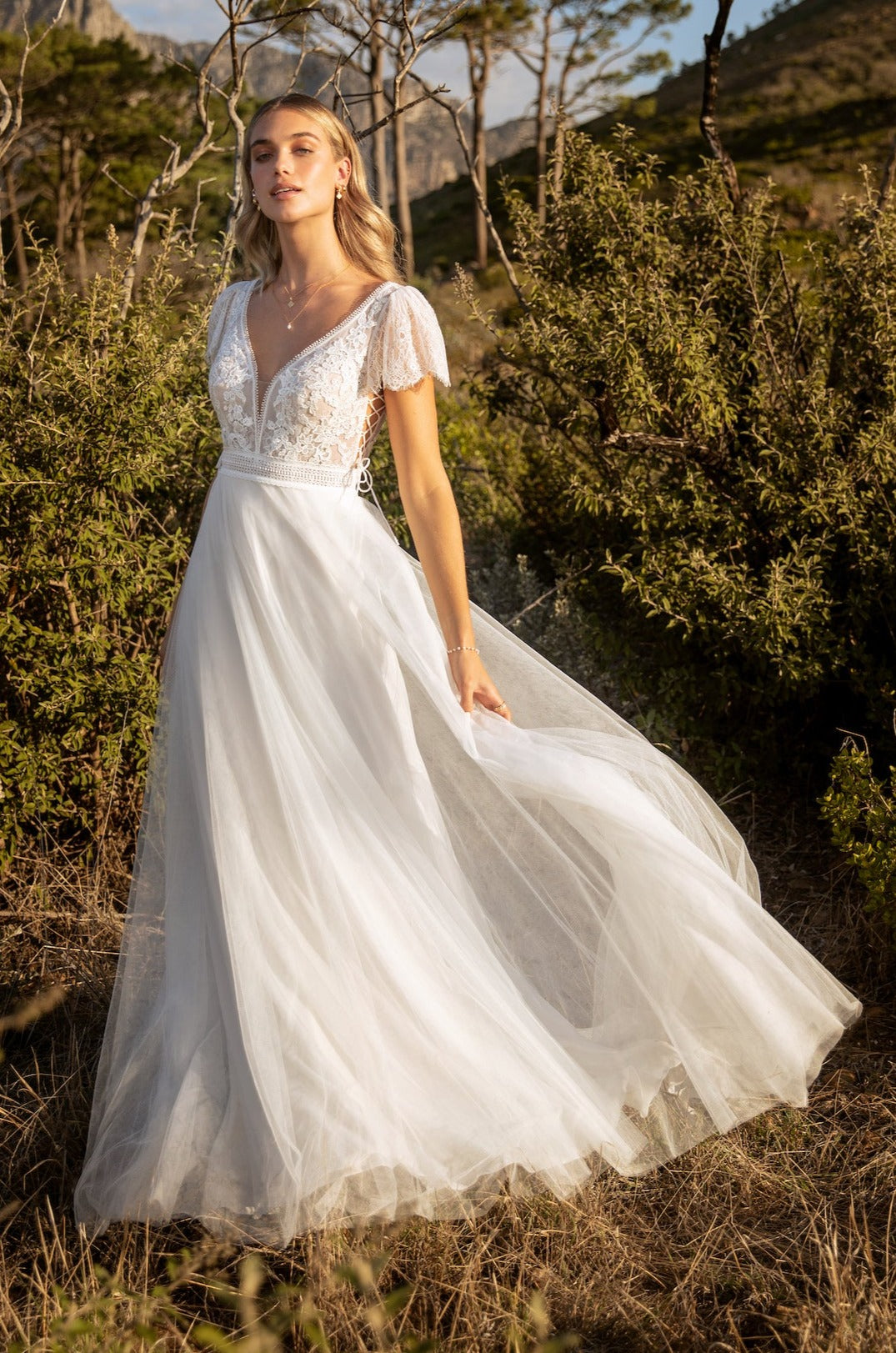 Boho wedding dress in lace and tulle with lace up detail. – Kelsey