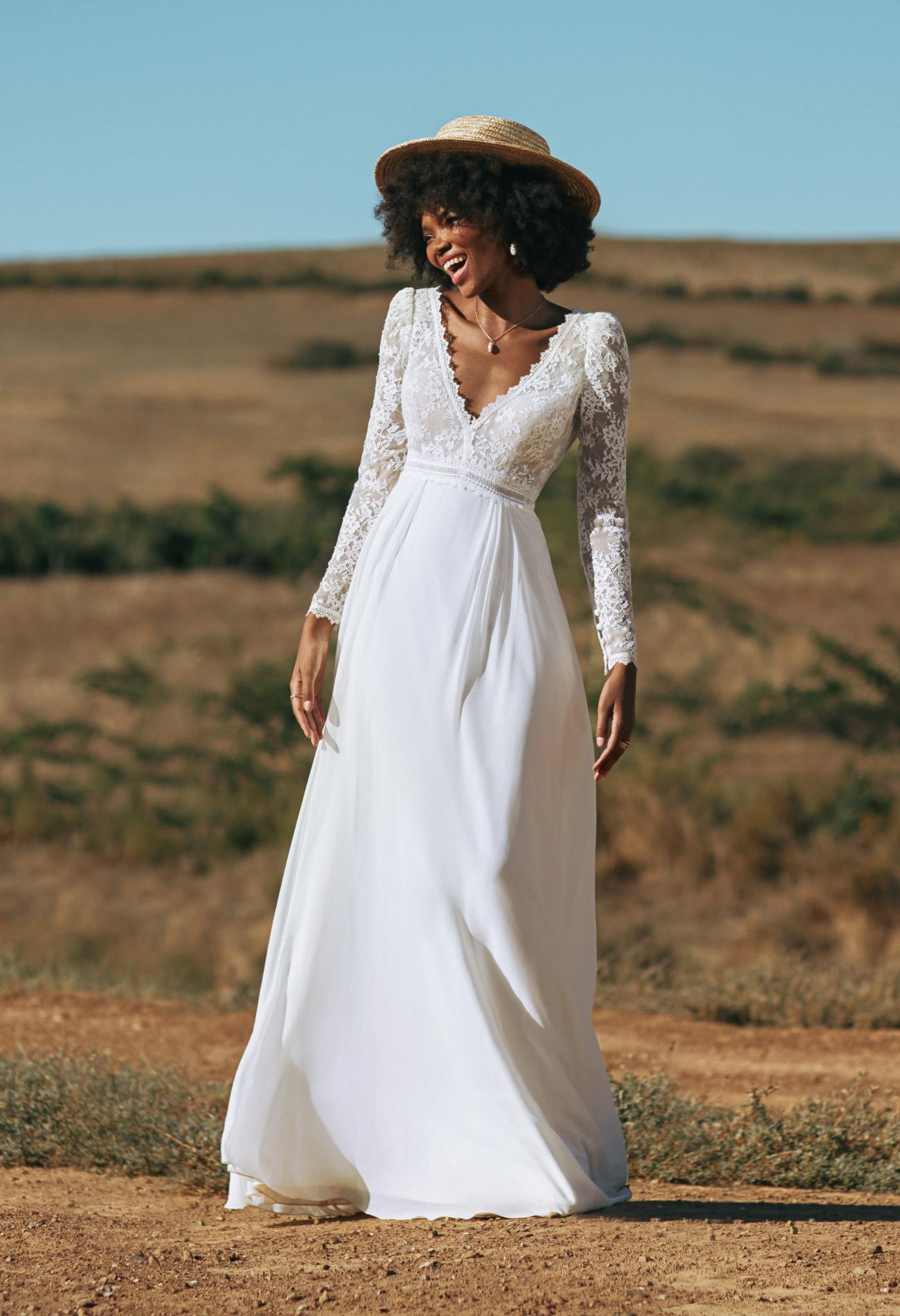 Long sleeve wedding dress in chantilly lace with chiffon skirt. Kelsey Rose Long sleeve wedding dress in chantilly lace with chiffon skirt. Kelsey Rose