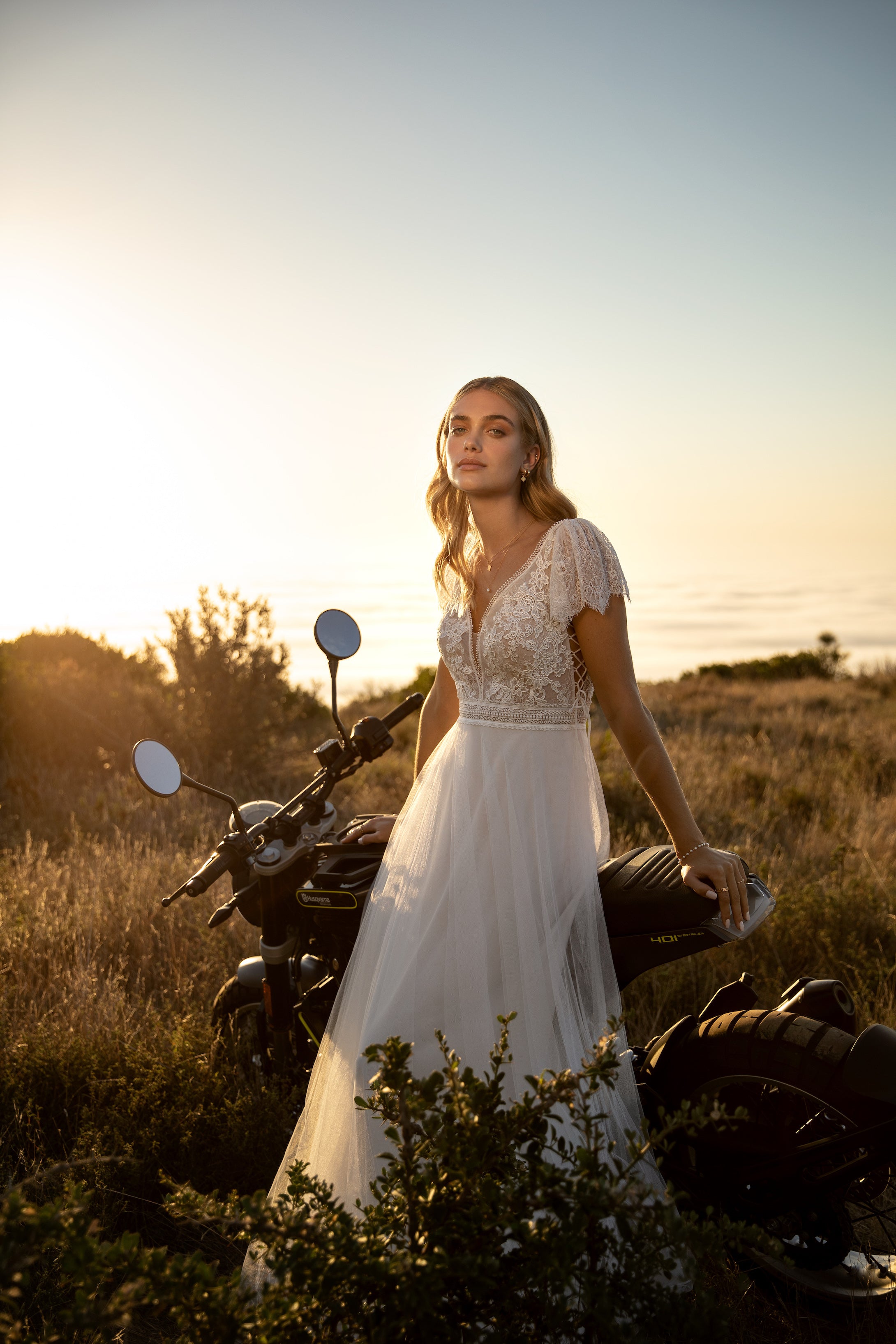 Boho wedding dress in lace and tulle with lace up detail. Kelsey